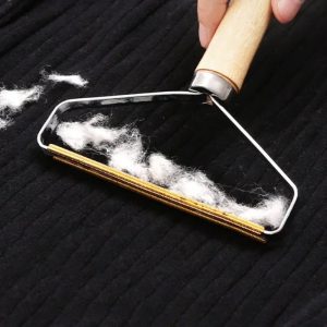 Метален отстранувач на влакна од ткаенини